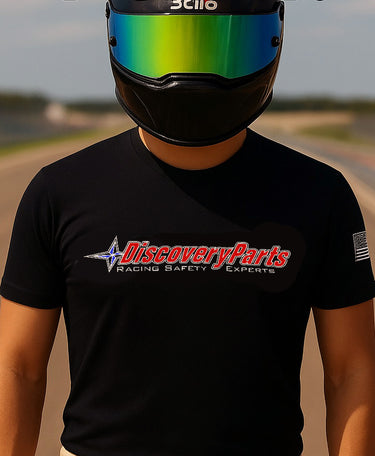 Driver wearing a Blackracing helmet and black t-shirt with Stilo, Recaro, Forgeline, and Sparco logos on the sleeve